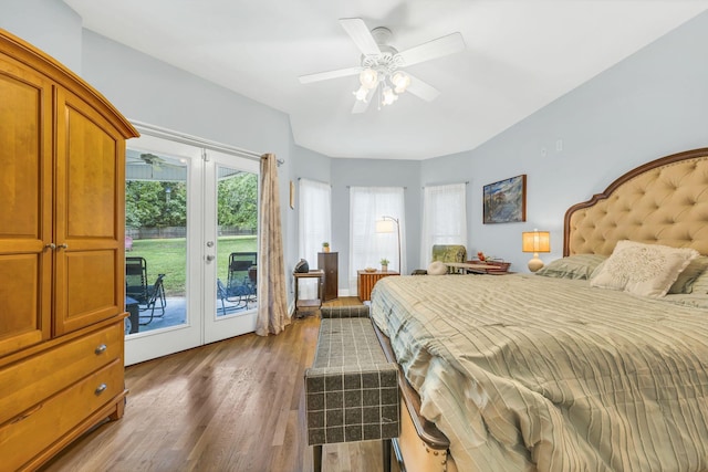 bedroom with french doors, access to exterior, wood finished floors, and a ceiling fan