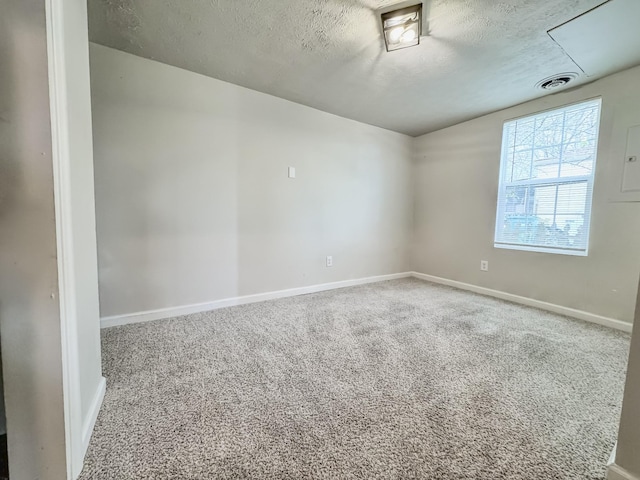 503 E Market St, Lebanon, TN 37087 - spare room featuring visible vents, baseboards, carpet floors, and a textured ceiling