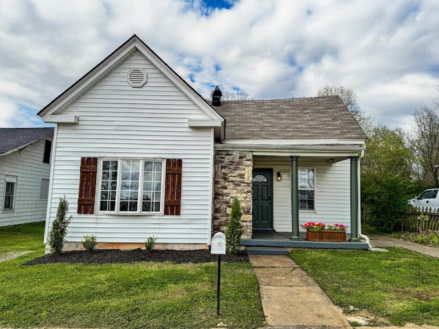 503 E Market St, Lebanon, TN 37087 - view of front of home with a porch, roof with shingles, and a front yard