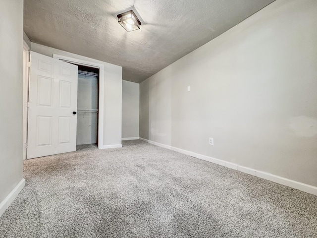 503 E Market St, Lebanon, TN 37087 - unfurnished bedroom featuring a textured ceiling, a closet, baseboards, and carpet floors