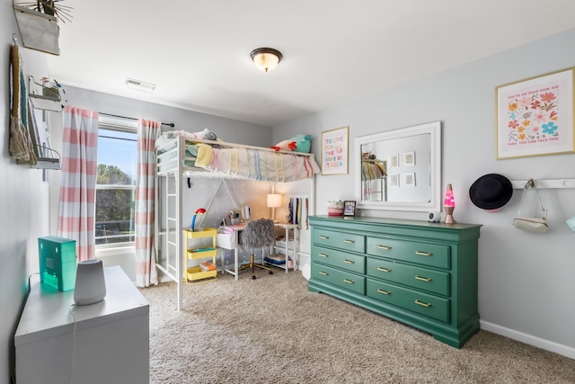 bedroom with carpet flooring, baseboards, and visible vents