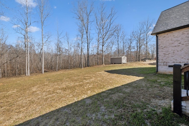 10015 Charleston Dr, Lyles, TN 37098 - view of yard with a storage shed and an outdoor structure
