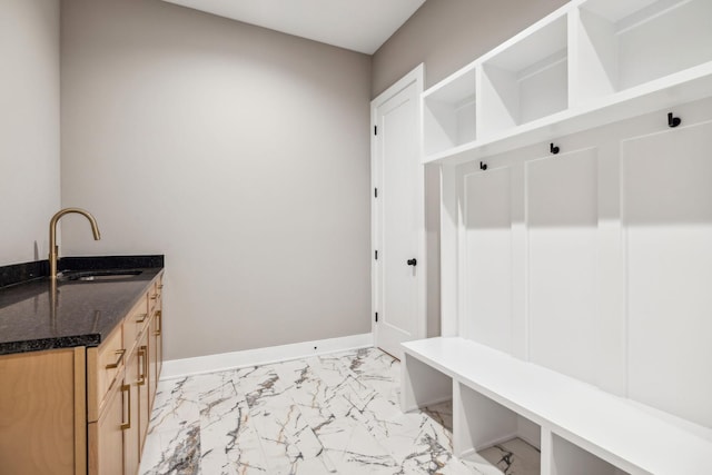 3207B Long Blvd, Nashville, TN 37203 - mudroom featuring baseboards, marble finish floor, and a sink