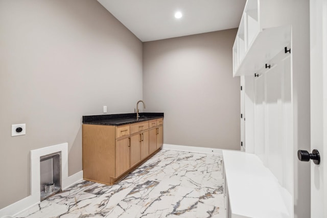 3207B Long Blvd, Nashville, TN 37203 - washroom with electric dryer hookup, a sink, marble finish floor, and baseboards