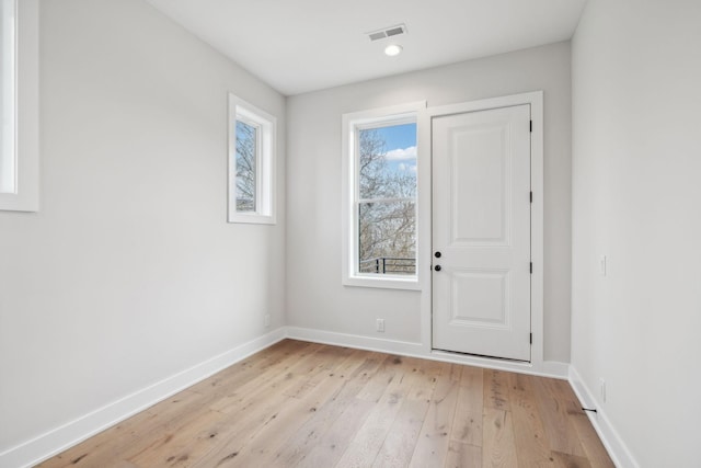 3207B Long Blvd, Nashville, TN 37203 - doorway to outside featuring visible vents, baseboards, and light wood-style floors