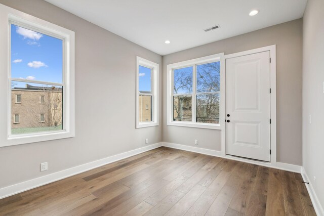 3207A Long Blvd, Nashville, TN 37203 - spare room with recessed lighting, visible vents, baseboards, and wood finished floors
