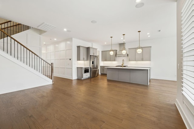 112 Shadow Springs Dr, Brentwood, TN 37027 - unfurnished living room featuring recessed lighting, stairway, dark wood-style floors, and baseboards