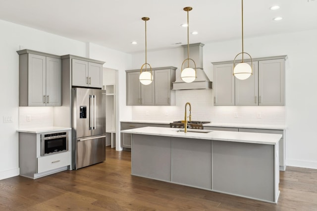 112 Shadow Springs Dr, Brentwood, TN 37027 - kitchen featuring custom range hood, decorative backsplash, stainless steel refrigerator with ice dispenser, and gray cabinetry