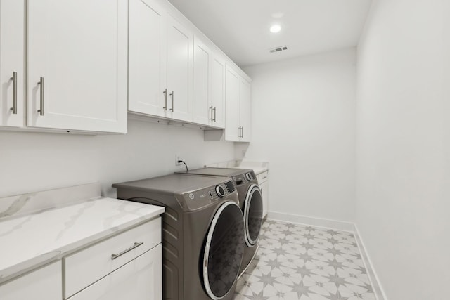 112 Shadow Springs Dr, Brentwood, TN 37027 - laundry room featuring separate washer and dryer, baseboards, visible vents, cabinet space, and light floors