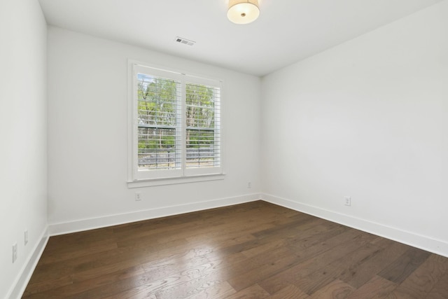 112 Shadow Springs Dr, Brentwood, TN 37027 - spare room featuring dark wood-style flooring, baseboards, and visible vents