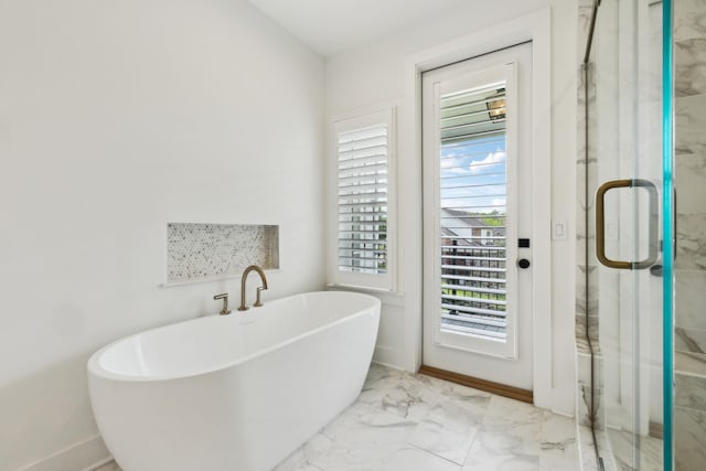 112 Shadow Springs Dr, Brentwood, TN 37027 - bathroom with marble finish floor, baseboards, a marble finish shower, and a soaking tub