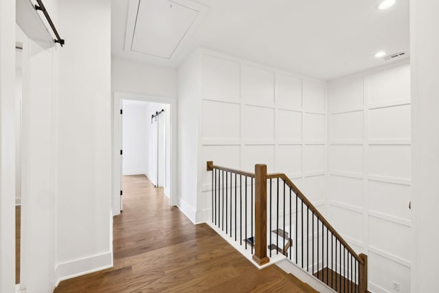 112 Shadow Springs Dr, Brentwood, TN 37027 - hallway featuring baseboards, recessed lighting, an upstairs landing, attic access, and wood finished floors