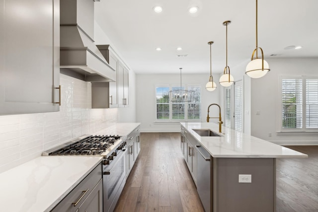 112 Shadow Springs Dr, Brentwood, TN 37027 - kitchen featuring tasteful backsplash, appliances with stainless steel finishes, light stone counters, dark wood finished floors, and a sink