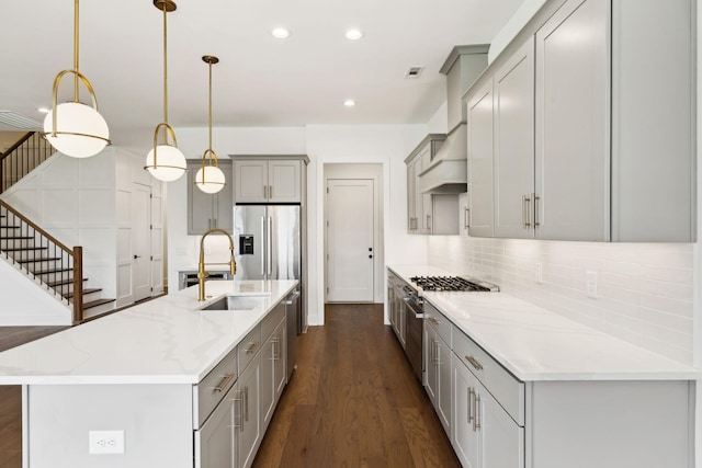 112 Shadow Springs Dr, Brentwood, TN 37027 - kitchen with tasteful backsplash, dark wood-style flooring, recessed lighting, stainless steel appliances, and gray cabinets