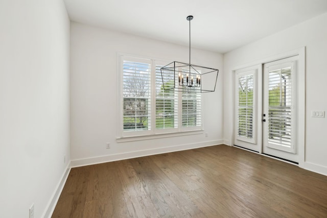 112 Shadow Springs Dr, Brentwood, TN 37027 - unfurnished dining area featuring plenty of natural light, a notable chandelier, and wood finished floors