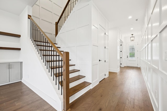 112 Shadow Springs Dr, Brentwood, TN 37027 - staircase featuring recessed lighting, baseboards, a decorative wall, and wood finished floors