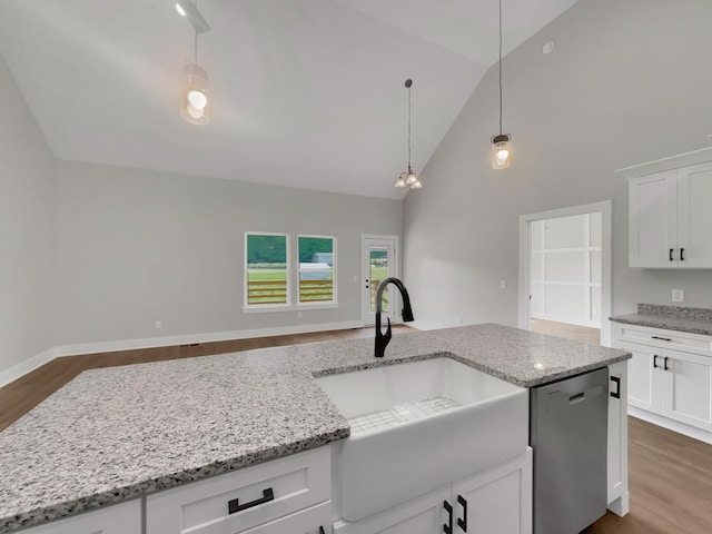 4 Young Branch Rd, Dixon Springs, TN 37057 - kitchen with dishwasher, dark wood-type flooring, high vaulted ceiling, white cabinets, and light stone counters