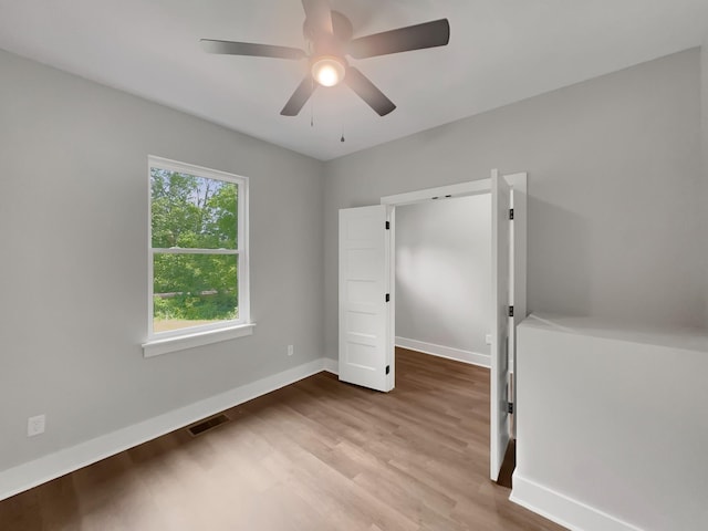 4 Young Branch Rd, Dixon Springs, TN 37057 - unfurnished bedroom featuring wood finished floors and a ceiling fan