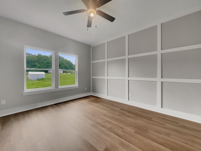 4 Young Branch Rd, Dixon Springs, TN 37057 - unfurnished room with wood finished floors, ceiling fan, and built in features