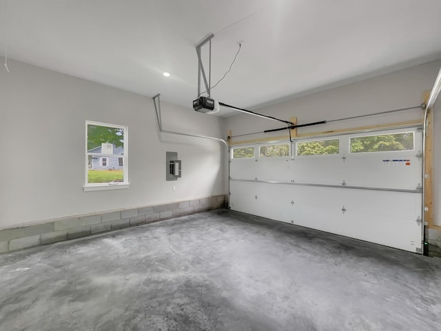 4 Young Branch Rd, Dixon Springs, TN 37057 - garage featuring a garage door opener and electric panel