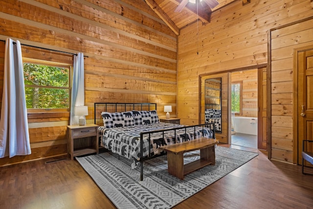 bedroom featuring wooden ceiling, wood walls, multiple windows, and wood finished floors