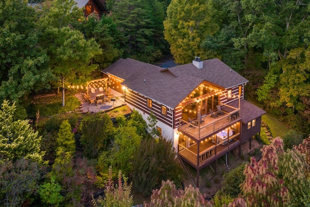 drone / aerial view with a view of trees