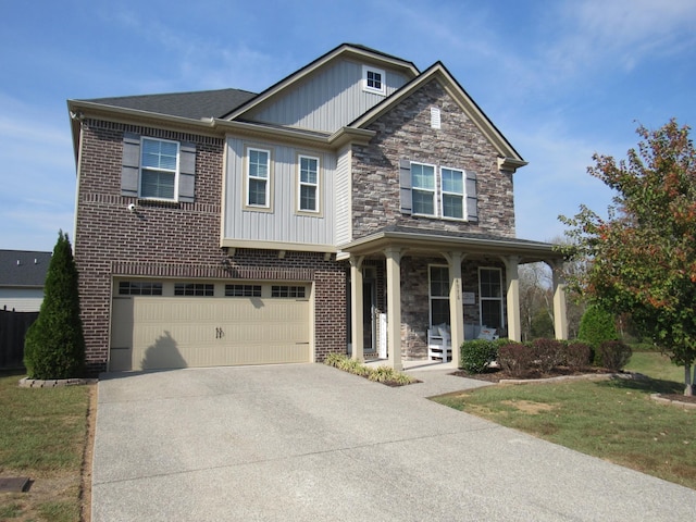 craftsman inspired home with an attached garage, covered porch, board and batten siding, brick siding, and driveway