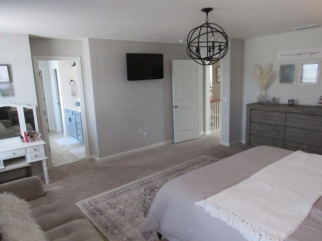 carpeted bedroom featuring ensuite bathroom, baseboards, an inviting chandelier, and visible vents