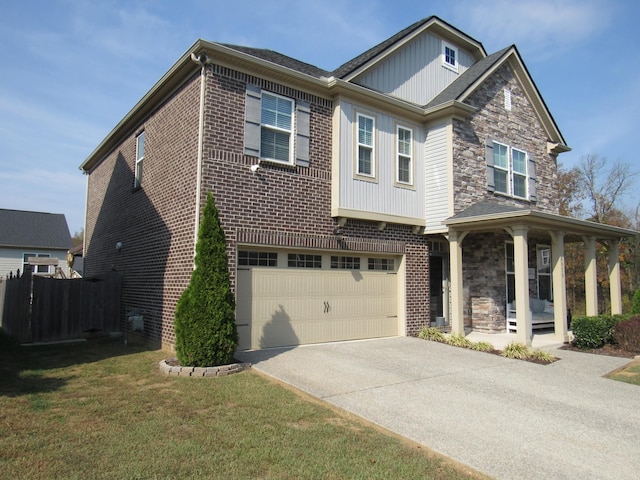craftsman house featuring driveway, stone siding, fence, and an attached garage