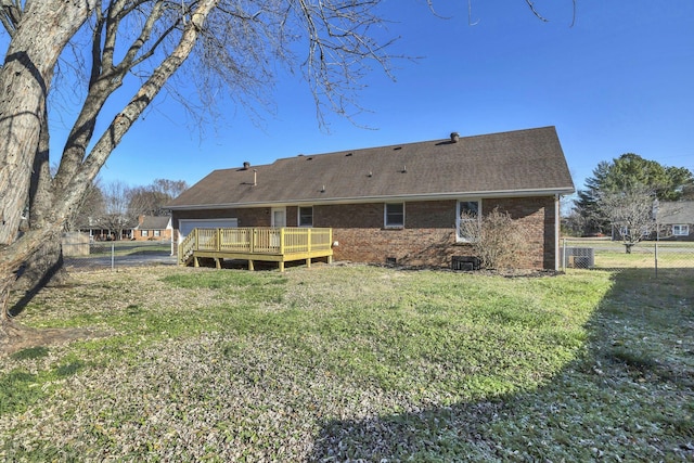 314 Shadowbrook Dr, Smyrna, TN 37167 - rear view of house featuring a lawn, a wooden deck, and a fenced backyard