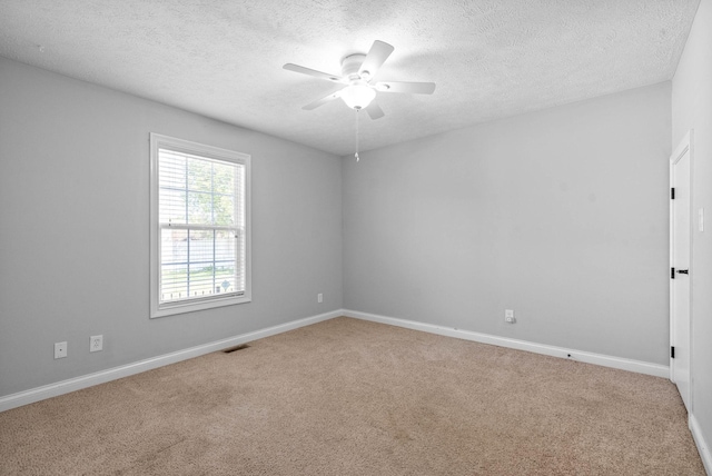 580 Mountain View Dr, Clarksville, TN 37043 - carpeted spare room with a textured ceiling, ceiling fan, baseboards, and visible vents