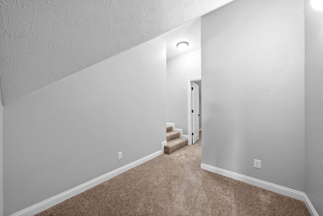 580 Mountain View Dr, Clarksville, TN 37043 - interior space featuring stairway, a textured ceiling, baseboards, and carpet floors