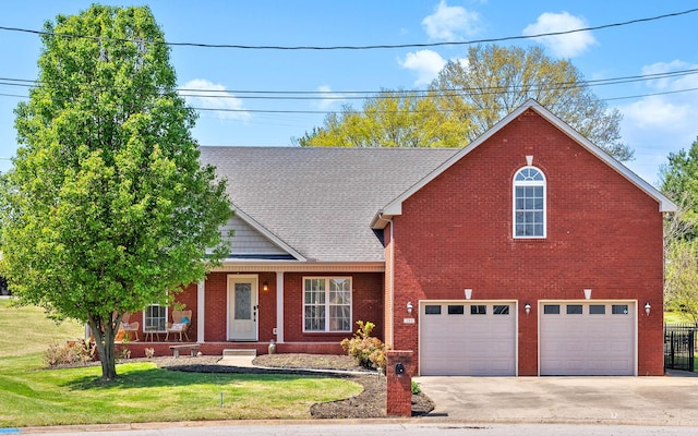 580 Mountain View Dr, Clarksville, TN 37043 - view of front of house with brick siding, a front lawn, a garage, and concrete driveway
