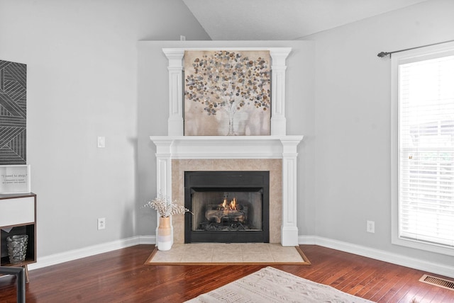 580 Mountain View Dr, Clarksville, TN 37043 - interior space with a fireplace with flush hearth, a healthy amount of sunlight, wood-type flooring, and visible vents