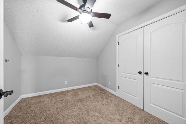 580 Mountain View Dr, Clarksville, TN 37043 - bonus room with baseboards, carpet, vaulted ceiling, and a textured ceiling