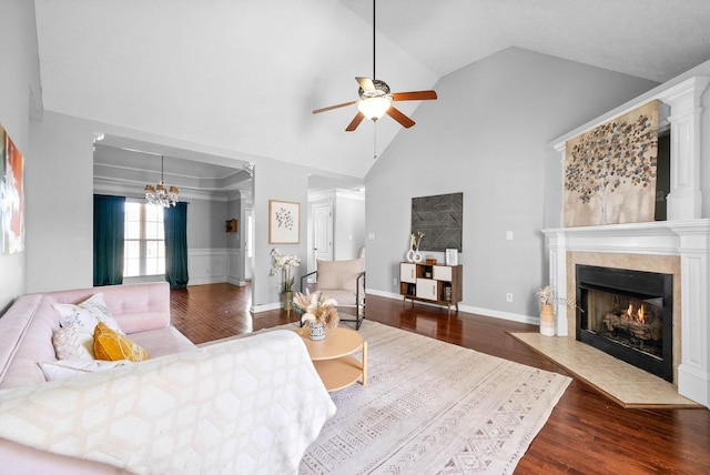 580 Mountain View Dr, Clarksville, TN 37043 - living room with high vaulted ceiling, dark wood-type flooring, a tile fireplace, and ceiling fan with notable chandelier