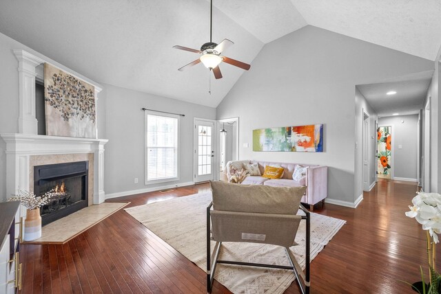 580 Mountain View Dr, Clarksville, TN 37043 - living area with high vaulted ceiling, a high end fireplace, dark wood-style flooring, and a ceiling fan