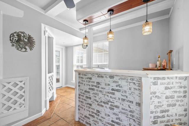 580 Mountain View Dr, Clarksville, TN 37043 - bar featuring tile patterned floors, baseboards, and hanging light fixtures