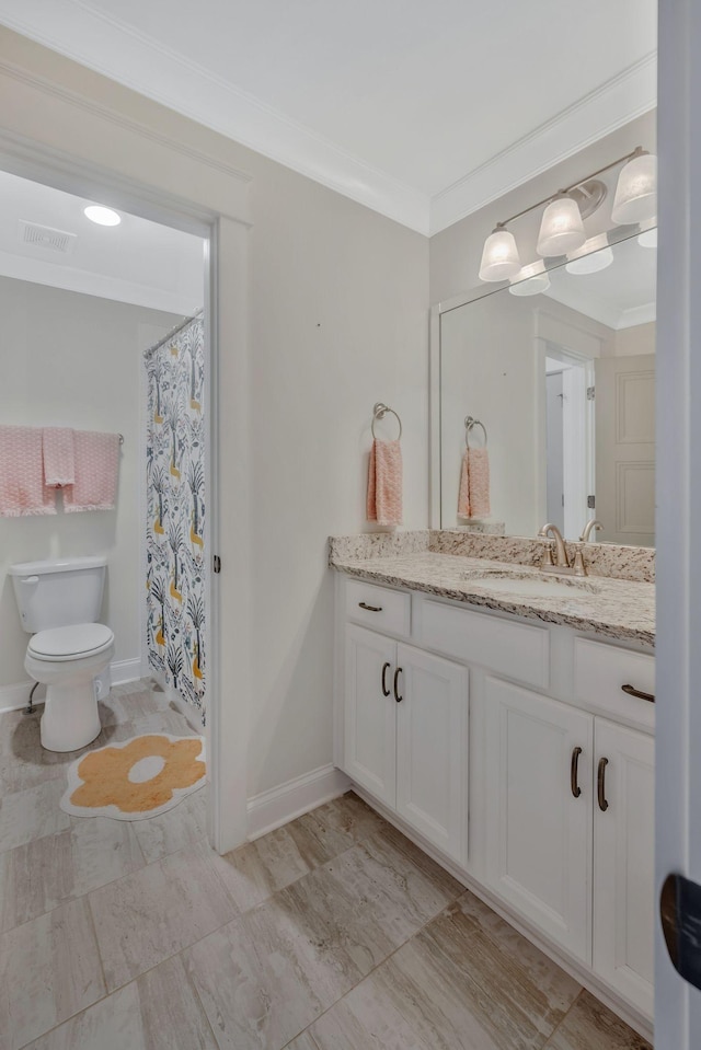 1009 Alpaca Dr, Spring Hill, TN 37174 - bathroom with toilet, vanity, ornamental molding, and visible vents