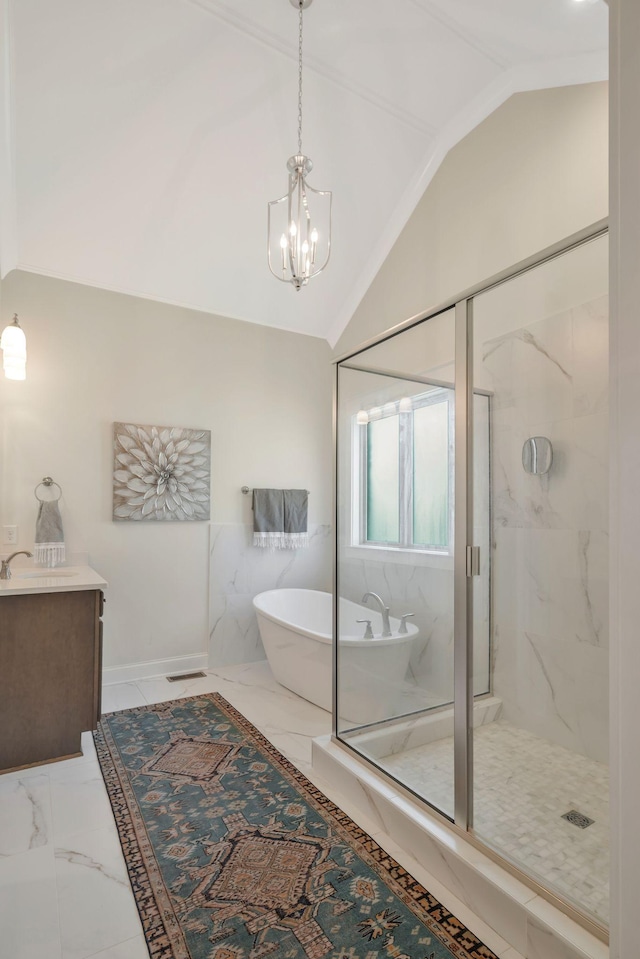 1009 Alpaca Dr, Spring Hill, TN 37174 - full bathroom with an inviting chandelier, vaulted ceiling, marble finish floor, a freestanding bath, and a marble finish shower