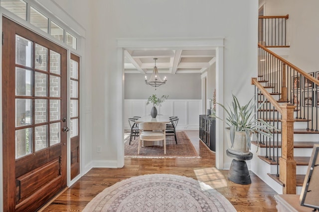 1009 Alpaca Dr, Spring Hill, TN 37174 - entrance foyer featuring wood finished floors, stairway, beamed ceiling, and coffered ceiling