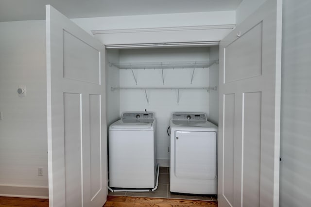 509D Chesterfield Ave, Nashville, TN 37212 - clothes washing area with wood finished floors, separate washer and dryer, and laundry area