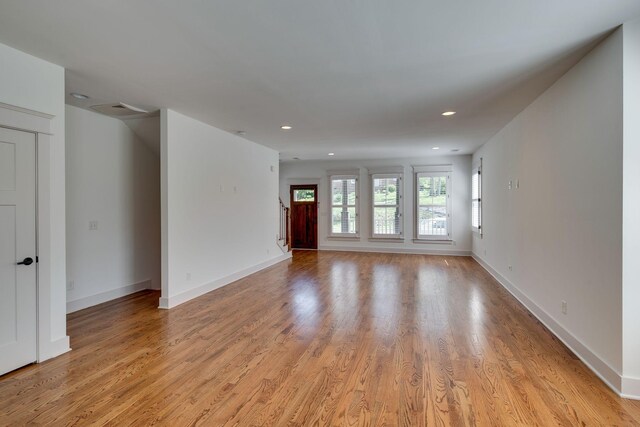 509D Chesterfield Ave, Nashville, TN 37212 - unfurnished living room featuring recessed lighting, visible vents, light wood-type flooring, and baseboards