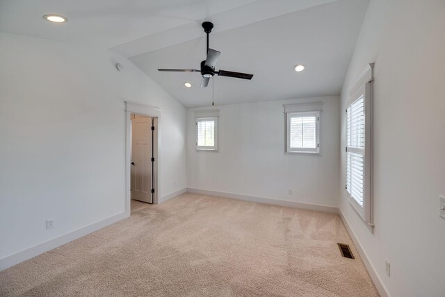 509D Chesterfield Ave, Nashville, TN 37212 - unfurnished room featuring light carpet, visible vents, baseboards, and vaulted ceiling