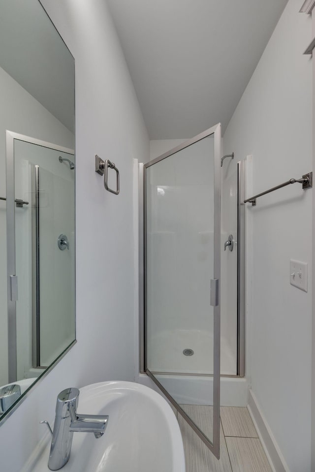 509D Chesterfield Ave, Nashville, TN 37212 - bathroom featuring a stall shower and a sink