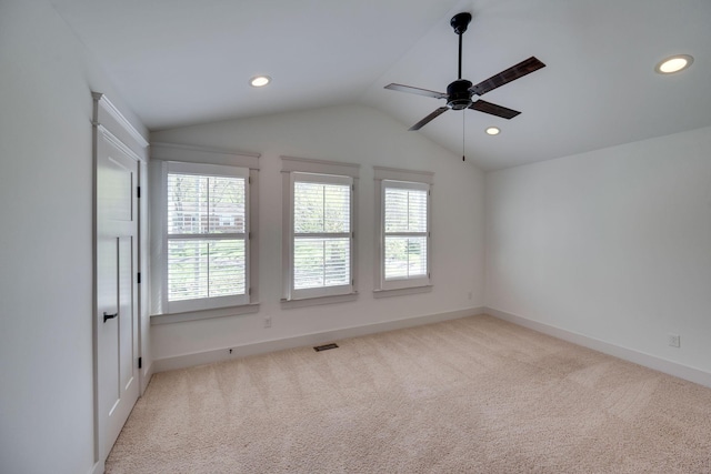 509D Chesterfield Ave, Nashville, TN 37212 - carpeted empty room with plenty of natural light, lofted ceiling, visible vents, and ceiling fan
