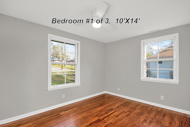 216 Belding Dr, Nashville, TN 37214 - unfurnished room with dark wood-type flooring, baseboards, and a wealth of natural light