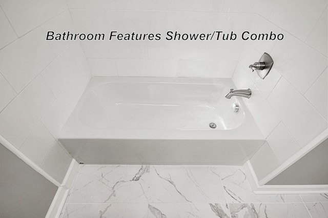 216 Belding Dr, Nashville, TN 37214 - bathroom with a tub to relax in and marble finish floor