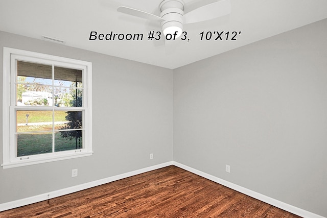 216 Belding Dr, Nashville, TN 37214 - spare room featuring dark wood-style flooring, visible vents, baseboards, and a ceiling fan