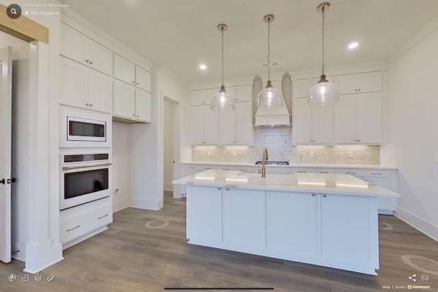 kitchen with custom exhaust hood, oven, baseboards, dark wood-type flooring, and built in microwave